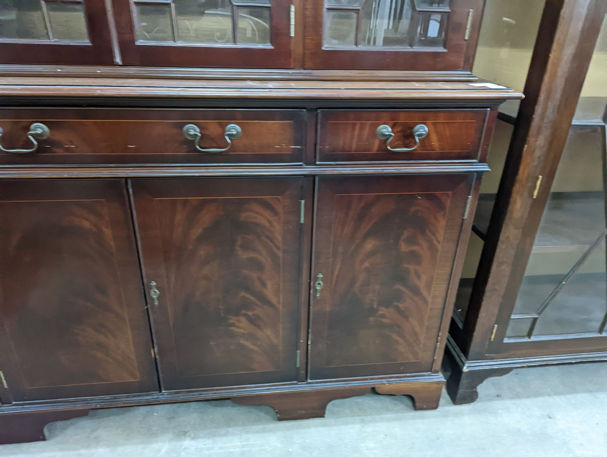 A reproduction George III style mahogany library bookcase, length 154cm, depth 41cm, height 193cm